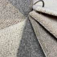 Wool rug vs synthetic